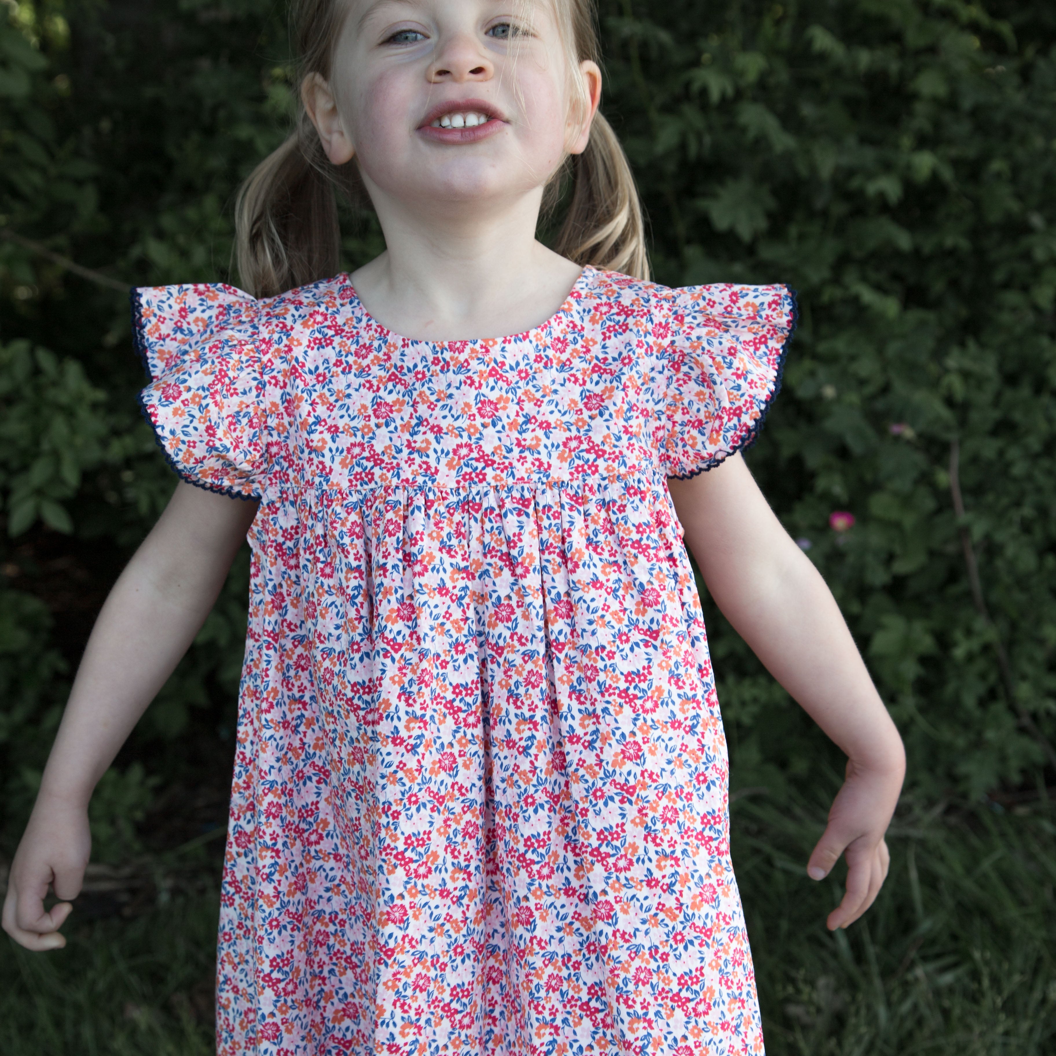 Girls Hannah Dress with Flutter Sleeves | Red and Blue Floral